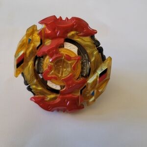 Red and Gold Spinning Battle Toy